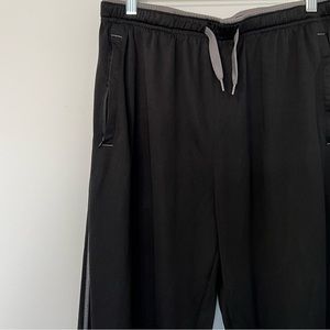 Grey and black sweatpants.